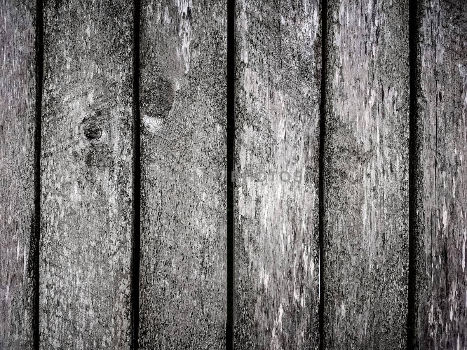 close up. a fragment of a wooden fence. photo with copy space