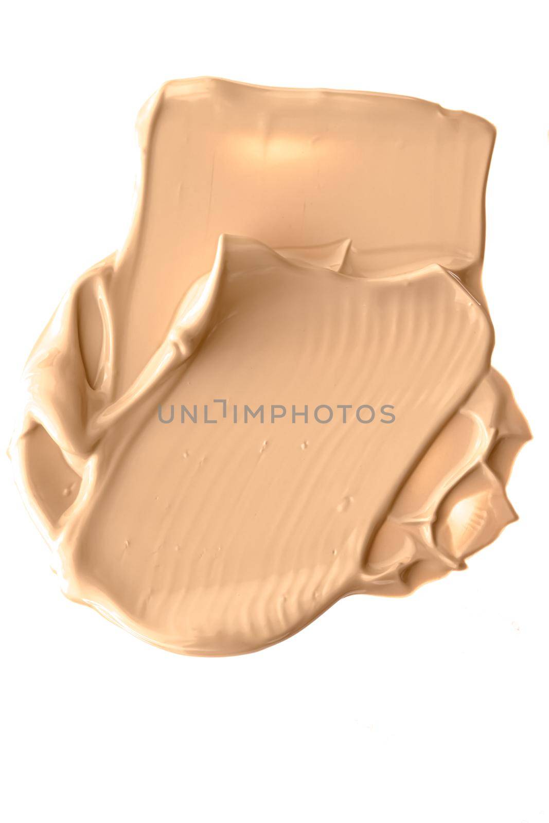 Beige beauty cosmetic texture isolated on white background, smudged makeup emulsion cream smear or foundation smudge, crushed cosmetics product and paint strokes.