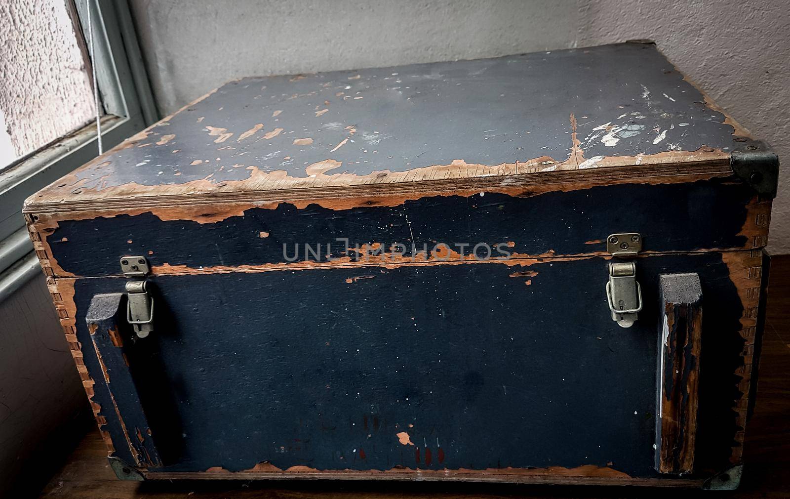 close up. an old chest on a wooden table. rarity