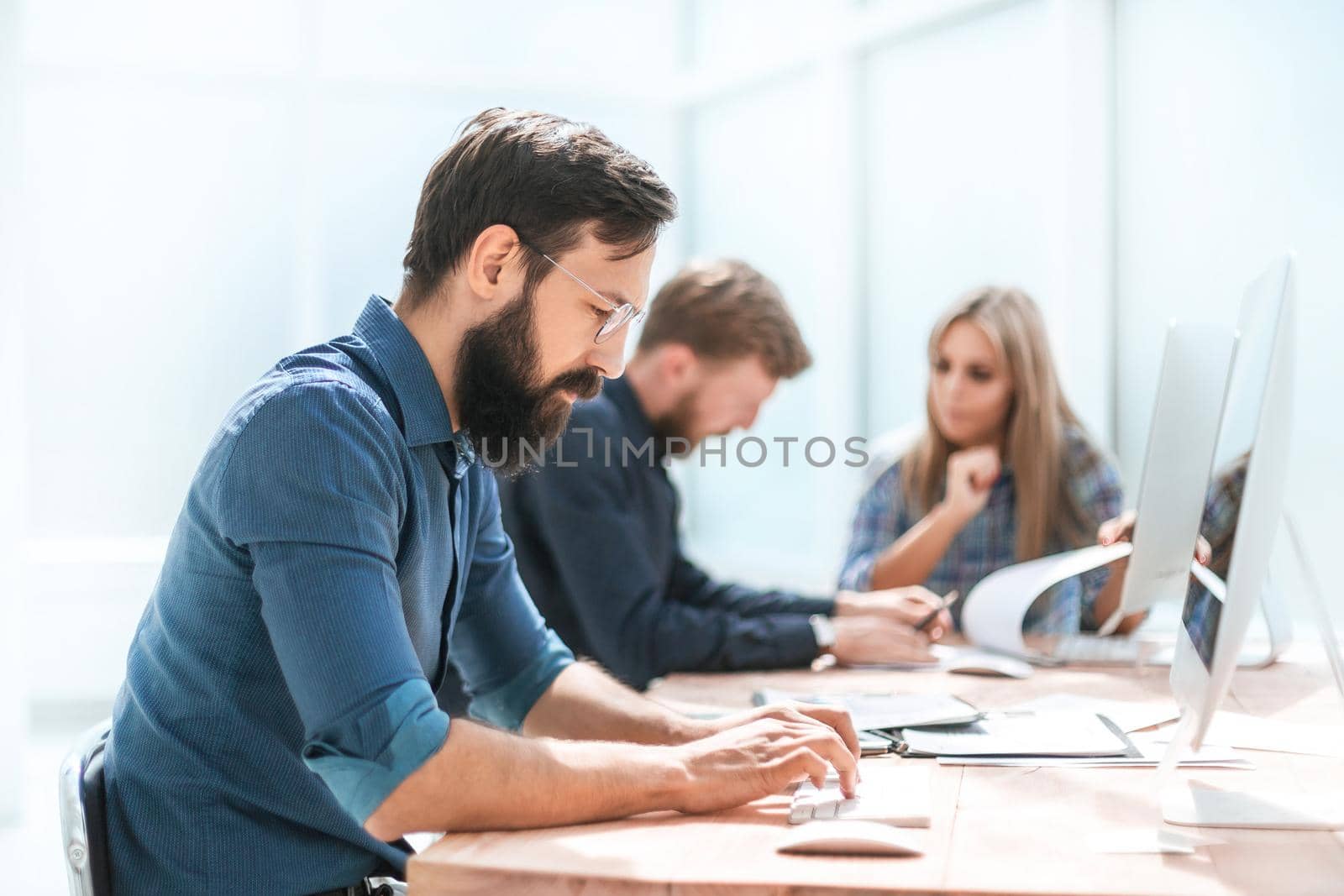 close up. businessman typed text on PC keyboard. people and technology