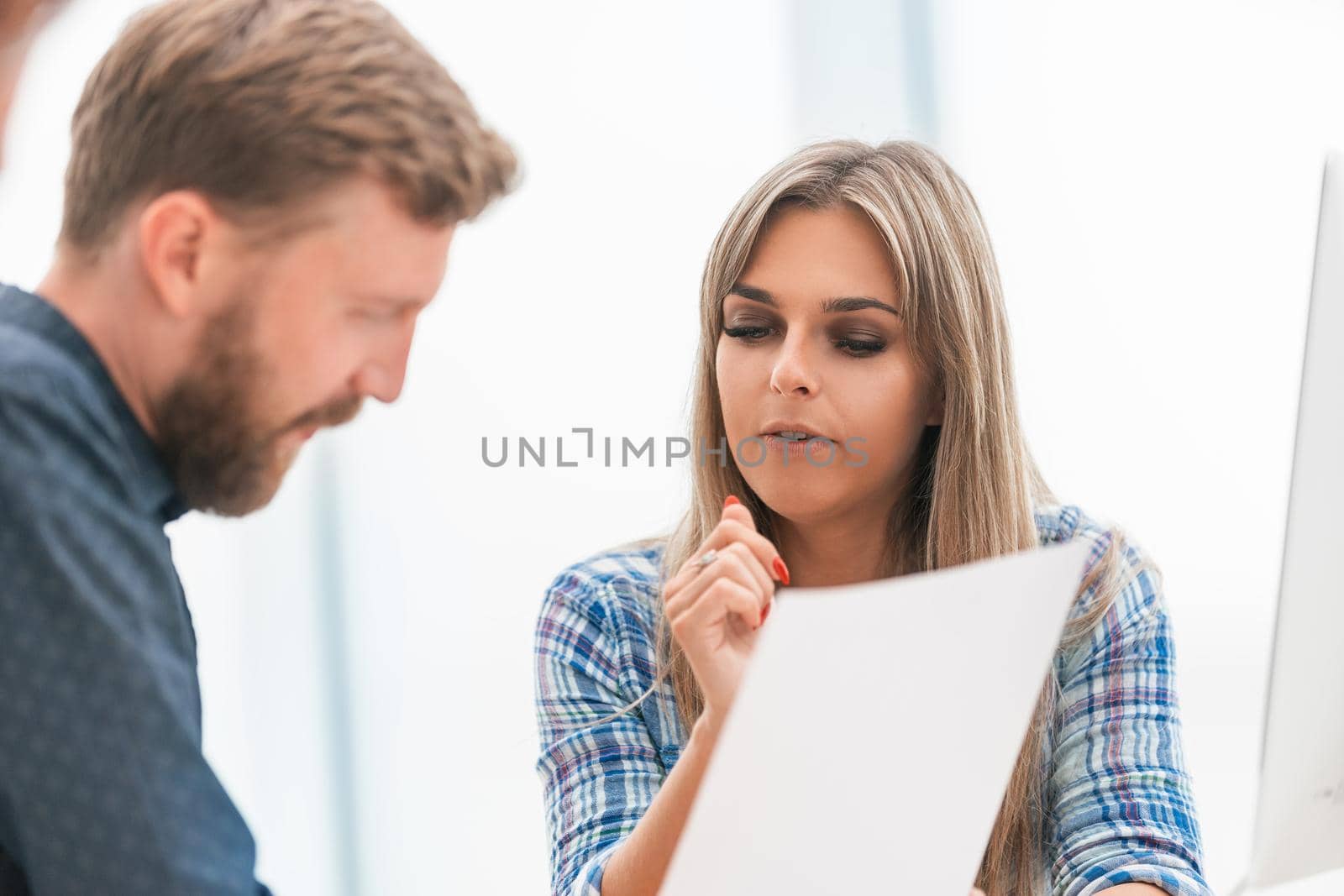 close up. young businesswoman at a meeting with the business team