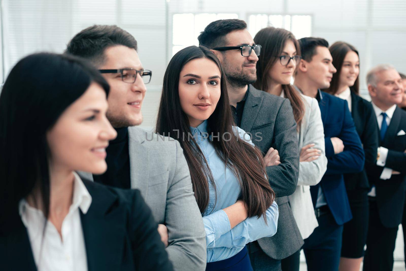 close up. professional team of business people standing together. the concept of teamwork