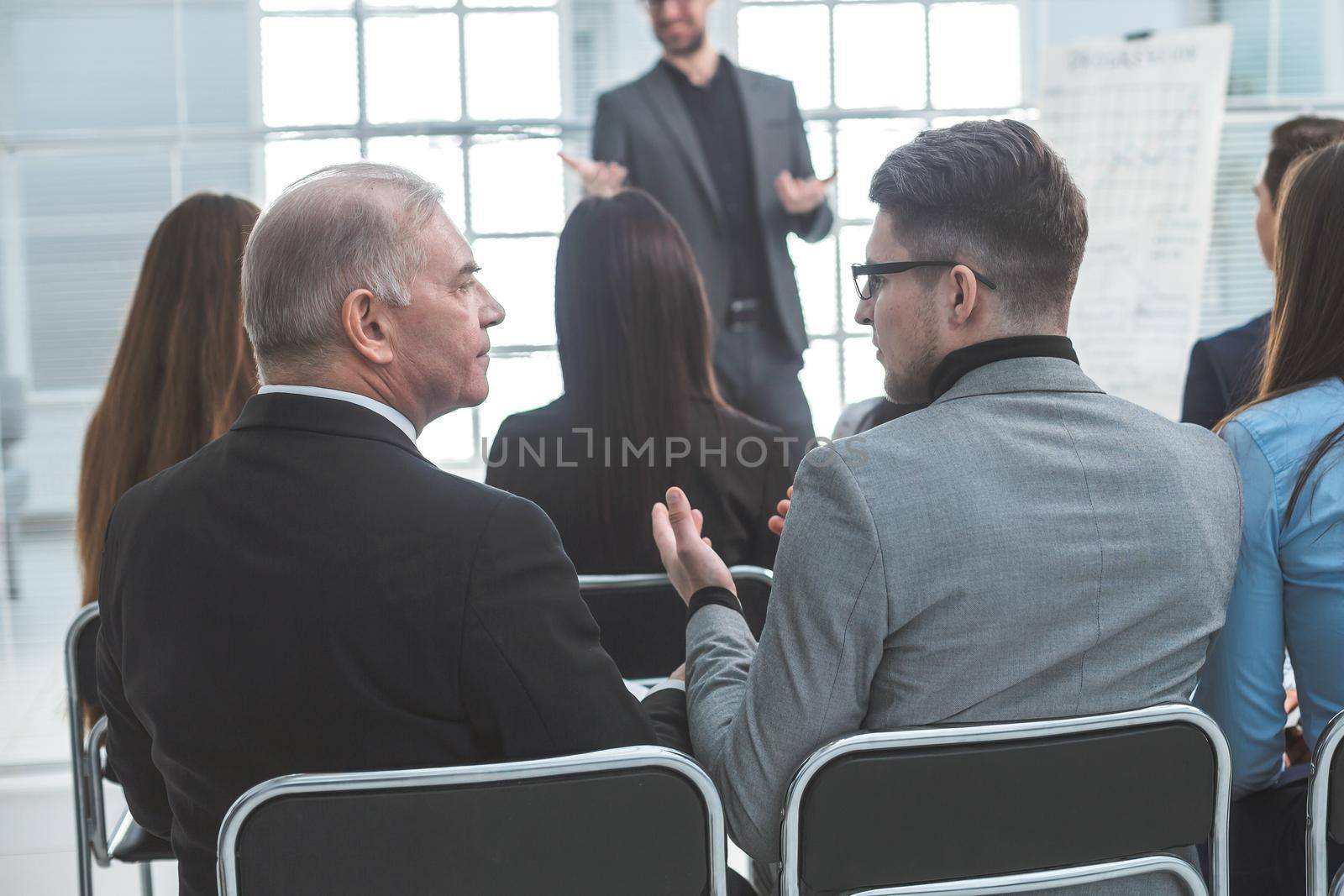 rear view. business people sitting in the conference room. business and education