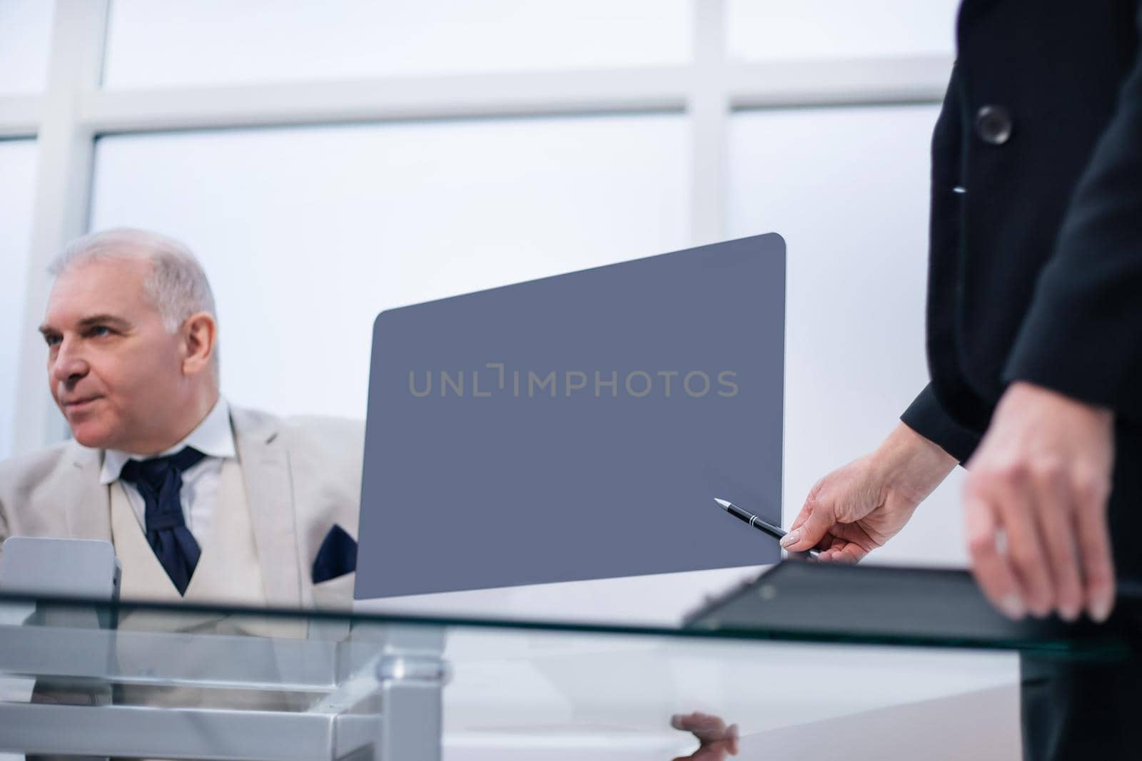 close up. business partners sitting at the negotiating table