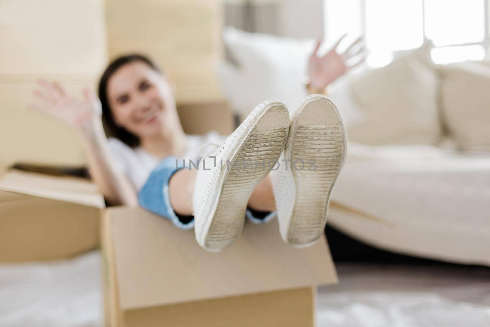 close up. young woman having fun in her new apartment