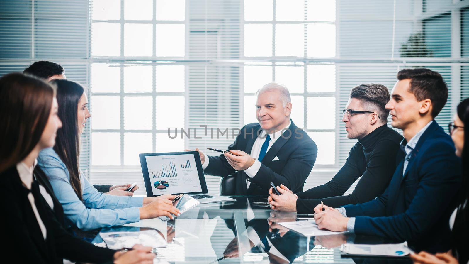 businessman discussing financial data at a working meeting. the concept of teamwork