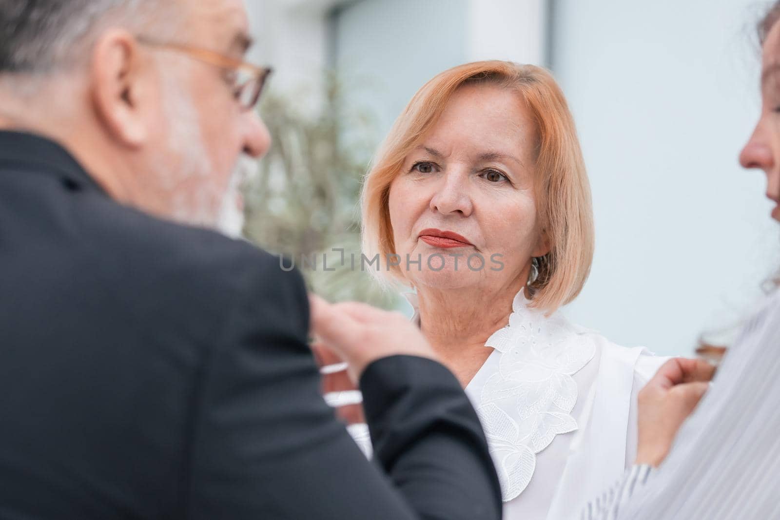 close up. serious business colleagues talking about something in the office. office weekdays