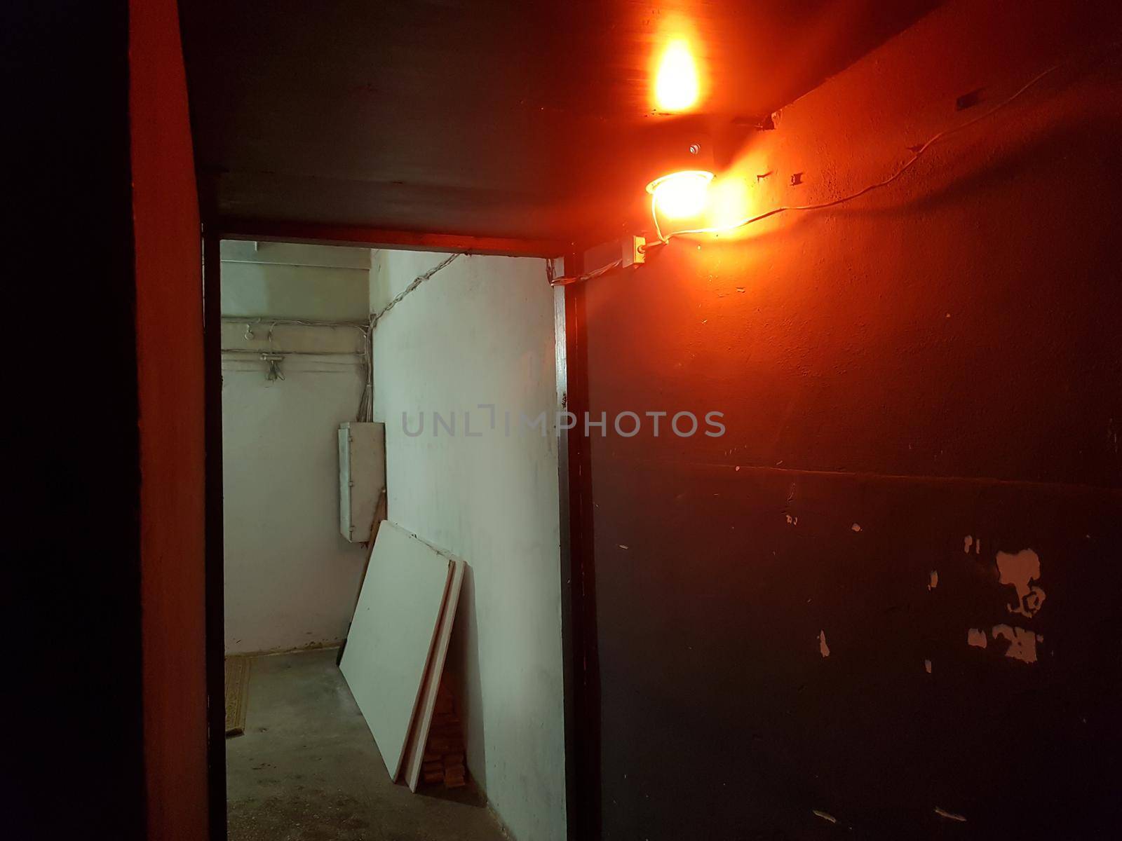 burning light in the room in the underground style. photo with copy space