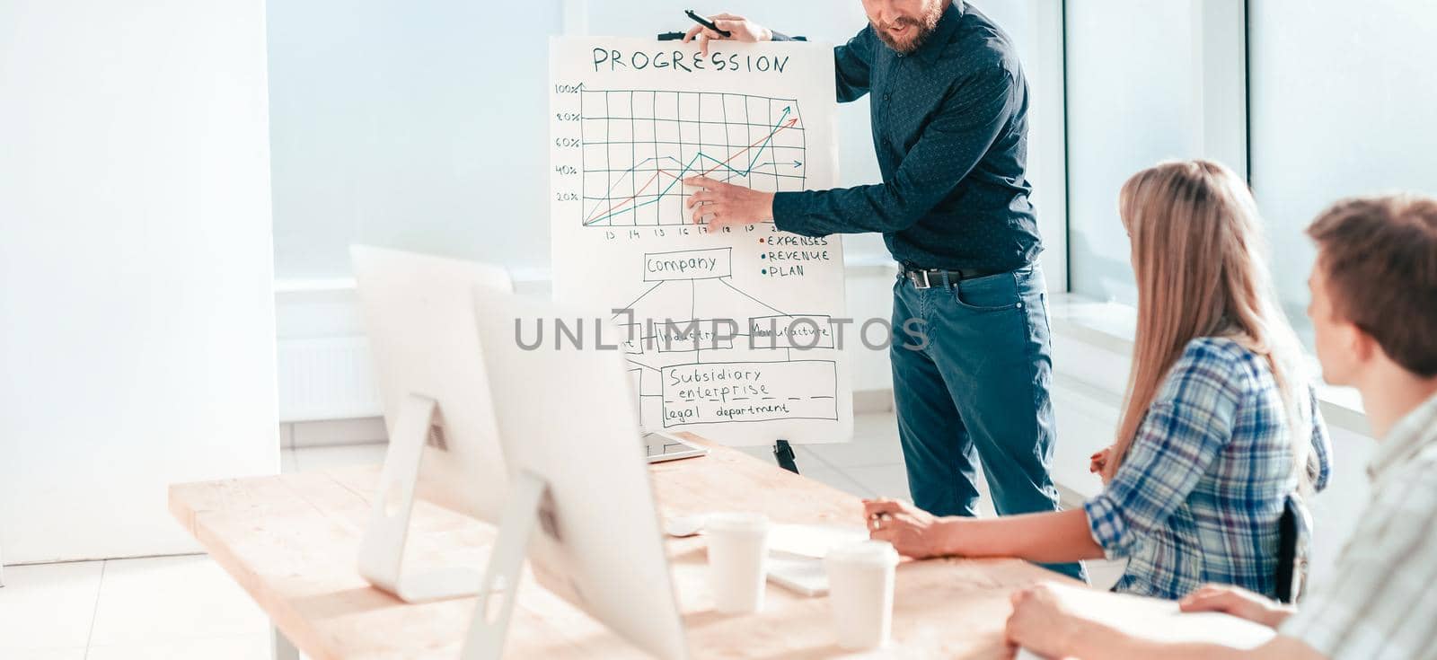businessman makes a report at a meeting with the business team . photo with copy space