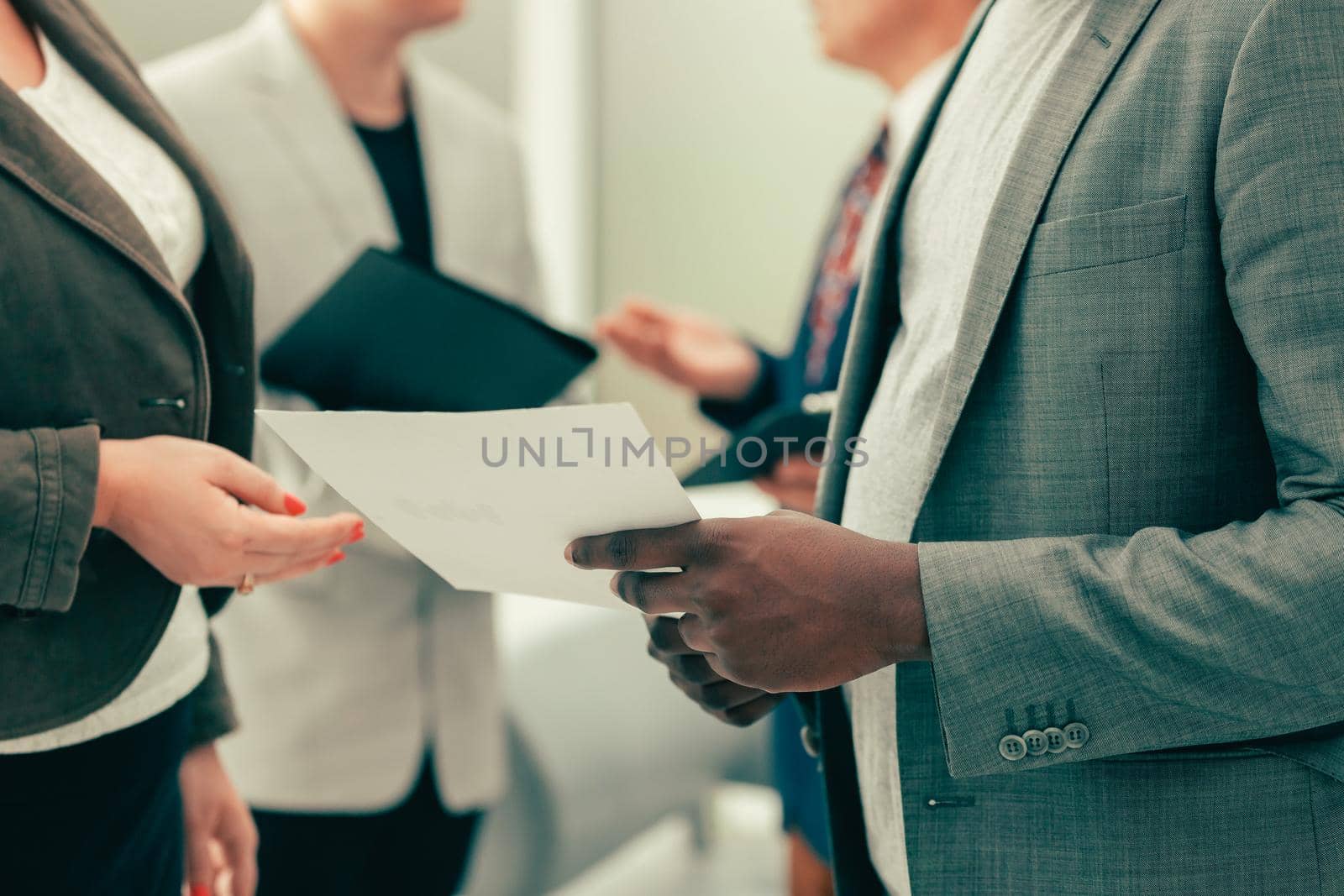close up. business colleagues discussing a business document. office workdays