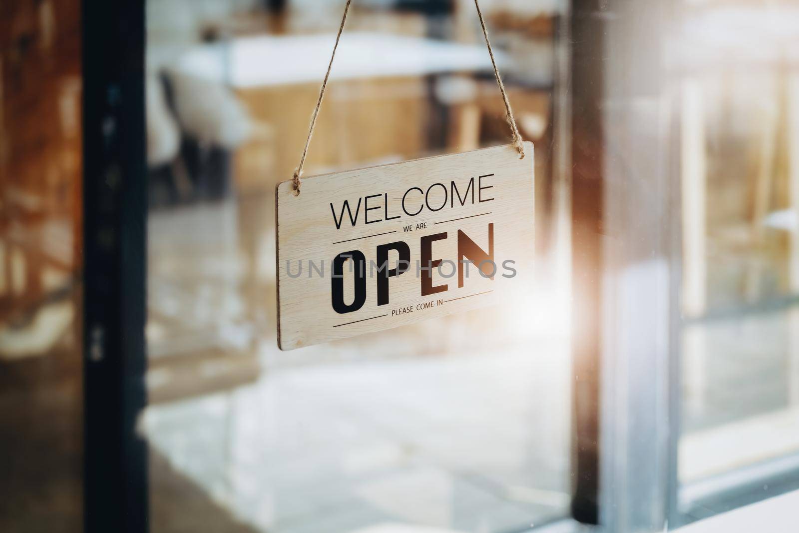 WELCOME WE ARE OPEN PLEASE COME IN notice sign wood board label hanging through glass door