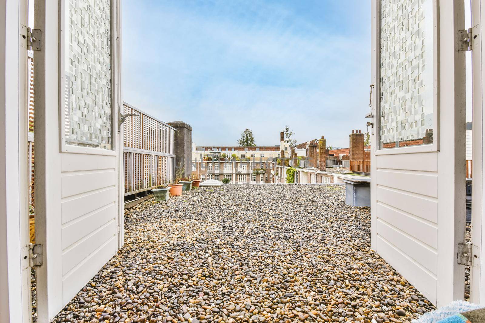 Open doors leading to the roof of the house