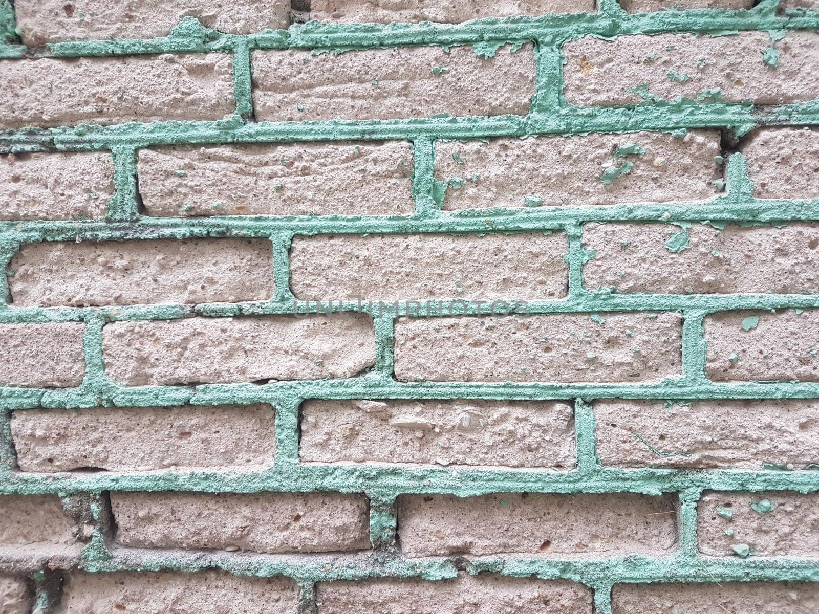 close up. fragment of the wall of white brick. background and texture