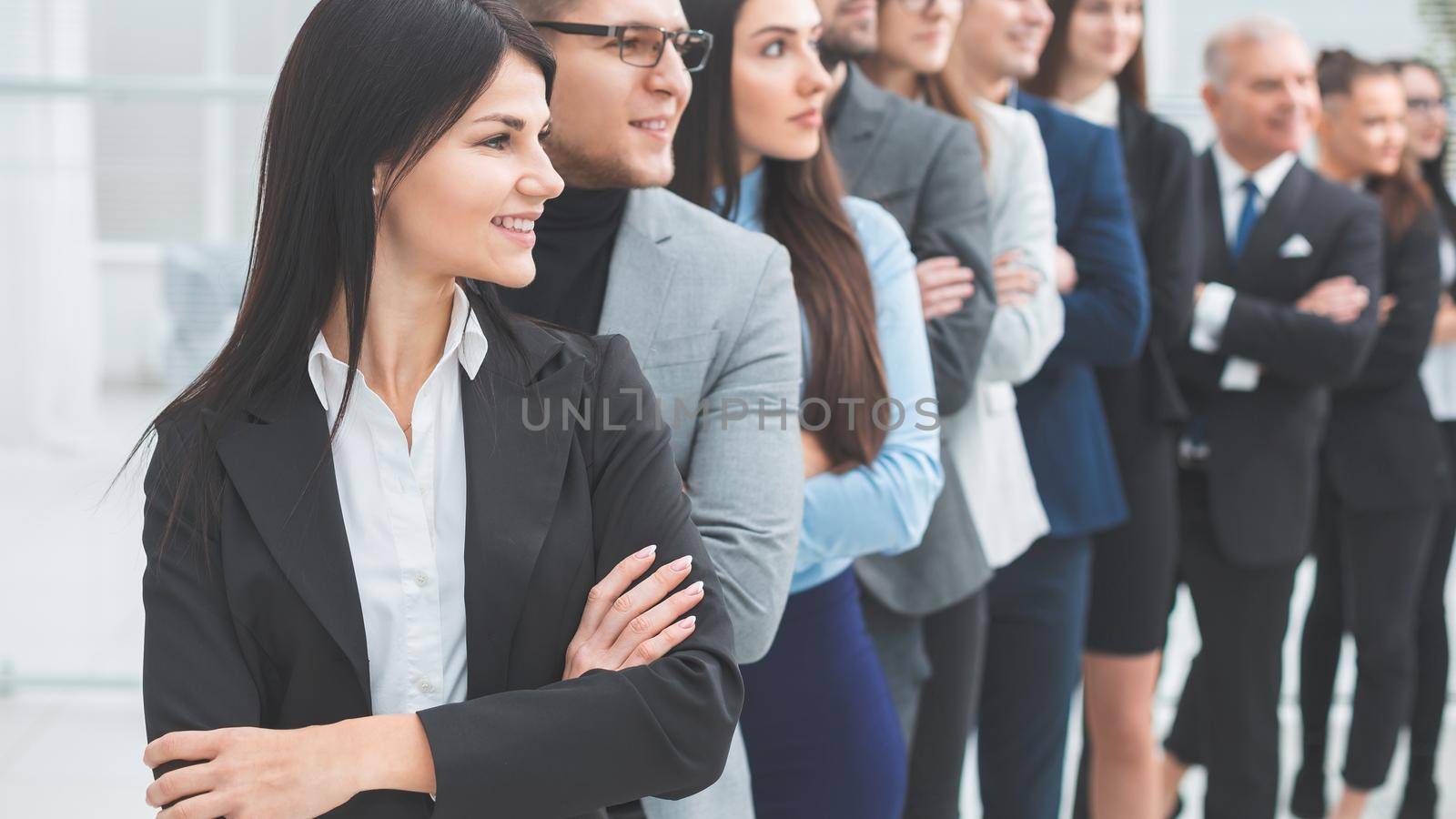 group of diverse business people standing togethe by SmartPhotoLab