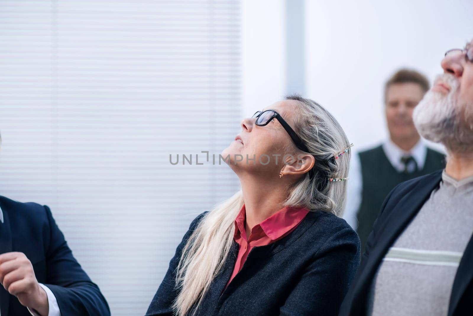 close up. a group of specialists at a working meeting in the office. business concept