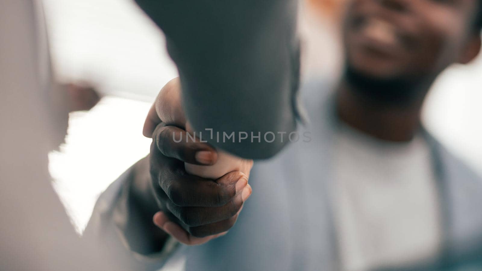 close up. image of a handshake of young business people. business background
