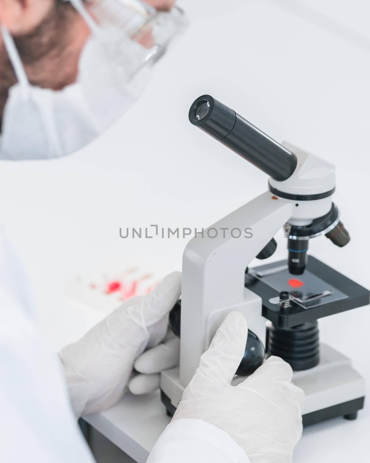 close up. scientist uses a microscope in a modern laboratory. photo with a copy-space.