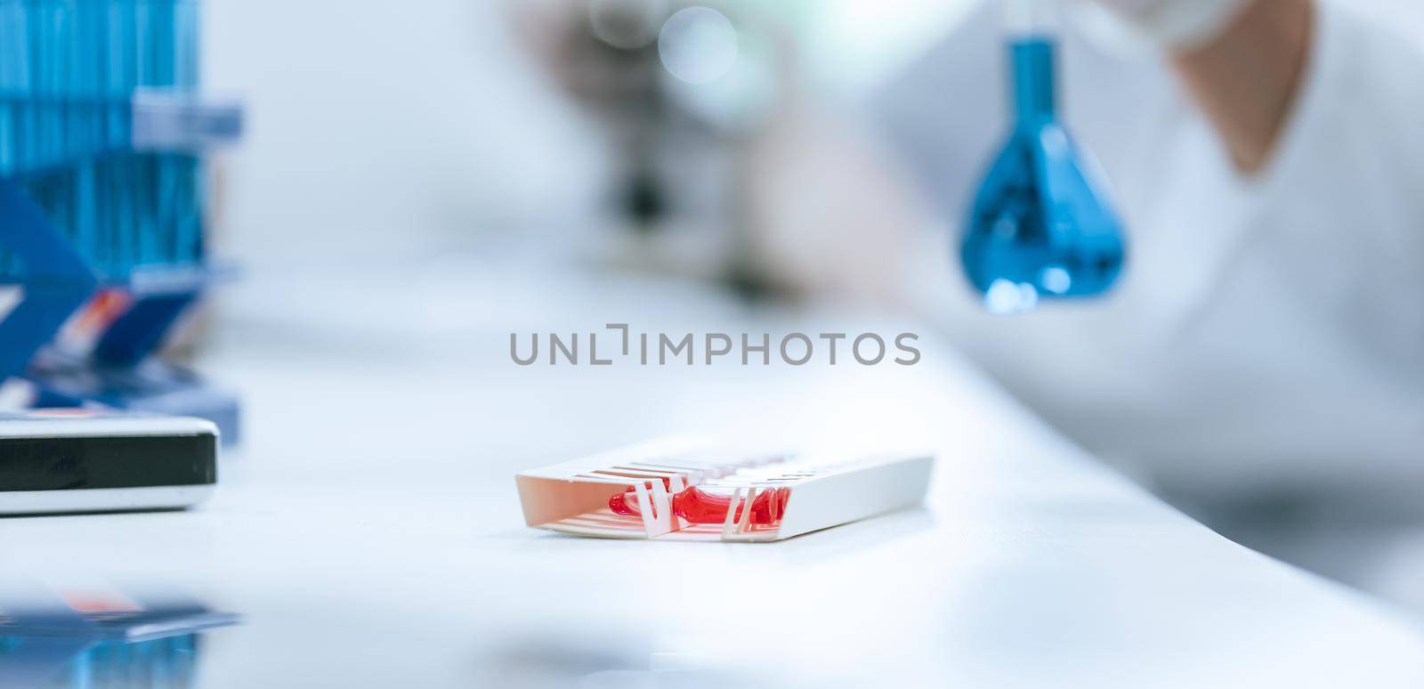 background image of a group of scientists in the laboratory. by SmartPhotoLab