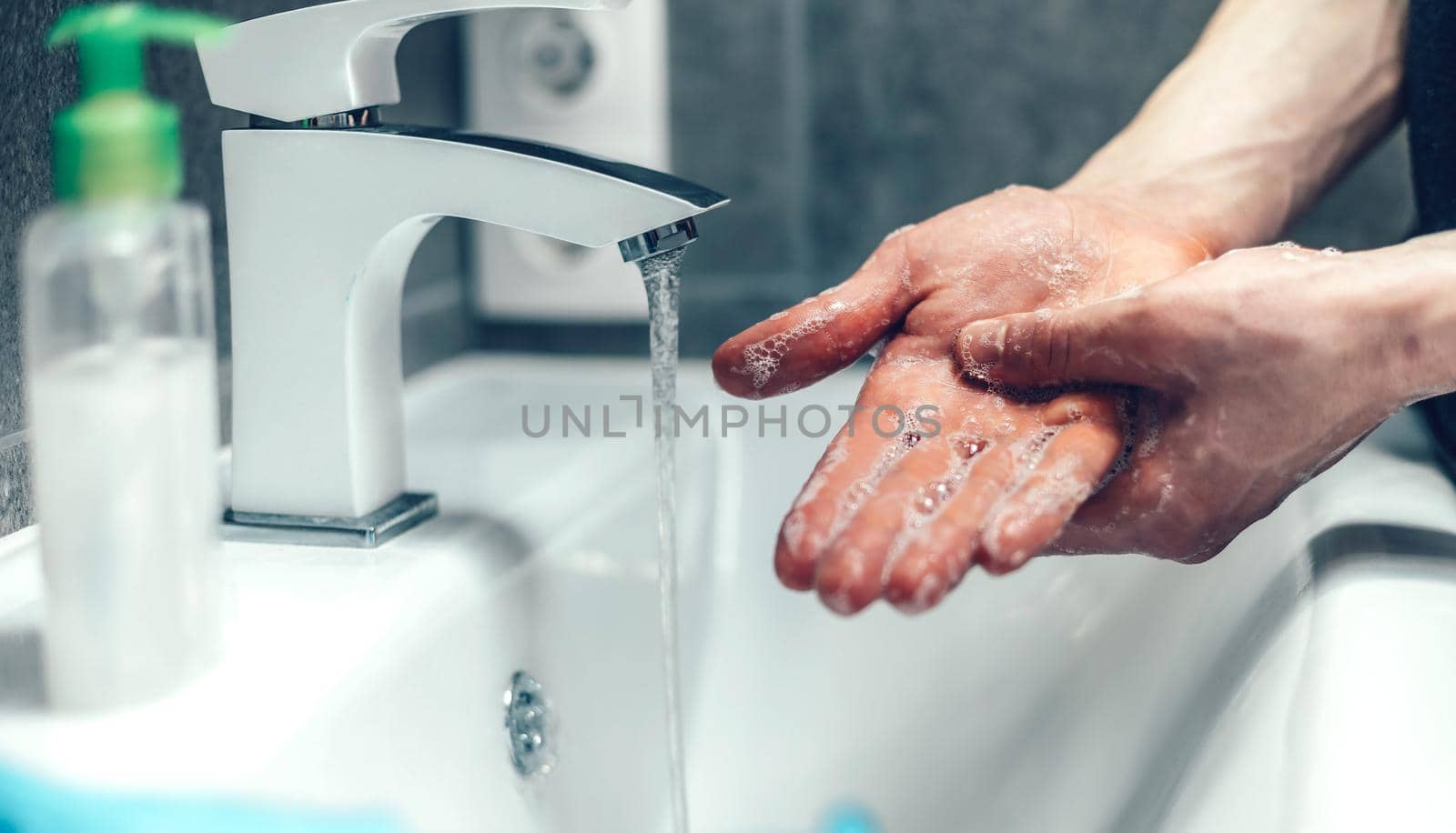 close-up. person carefully soaping the palms of his hands . concept of prevention of infectious diseases