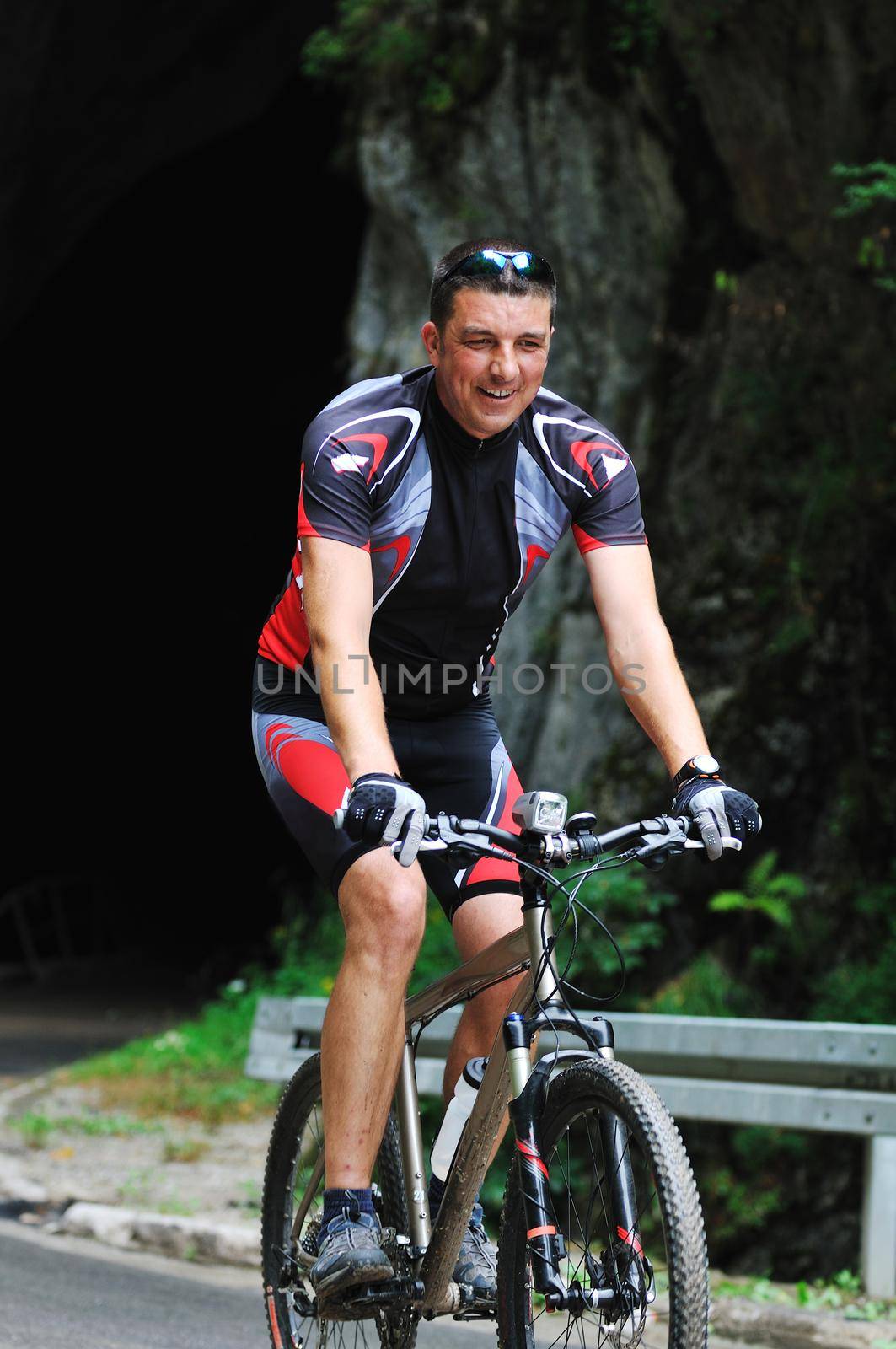 healthy lifestyle and fitness concept with mount bike man outdoor