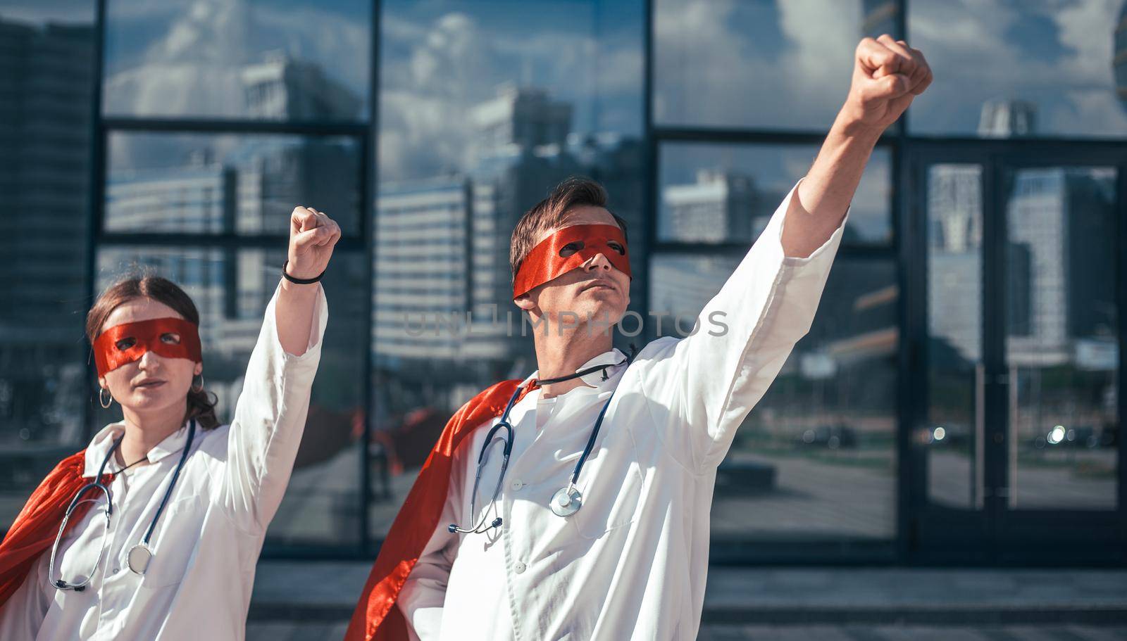 close up. doctors are superheroes standing on a city street . photo with a copy-space.