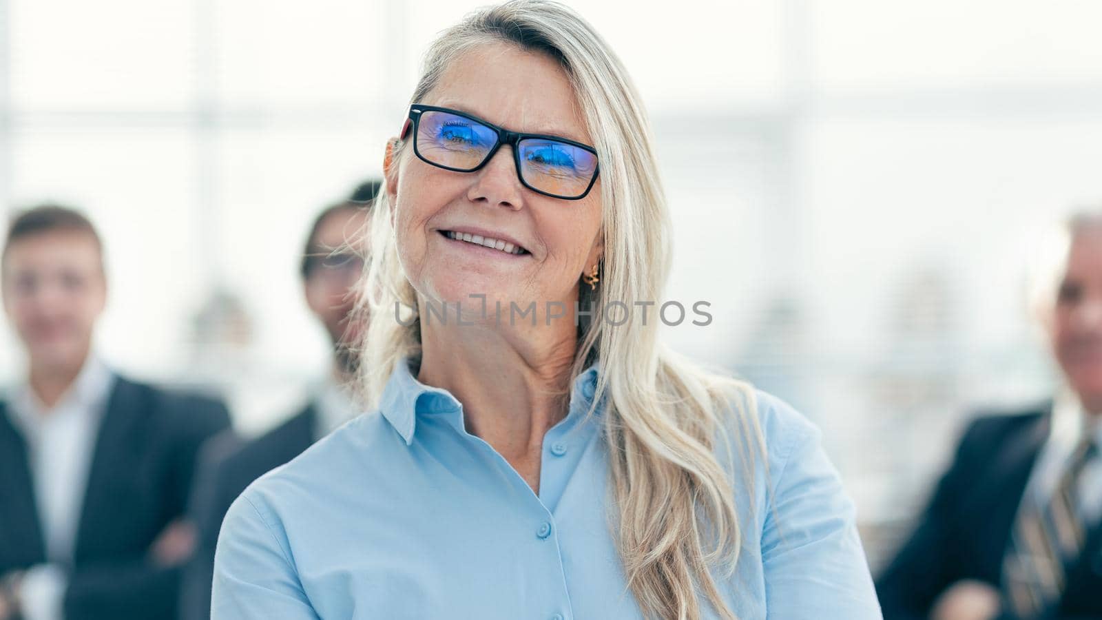 close up. successful business woman looking forward .photo with a copy of the space