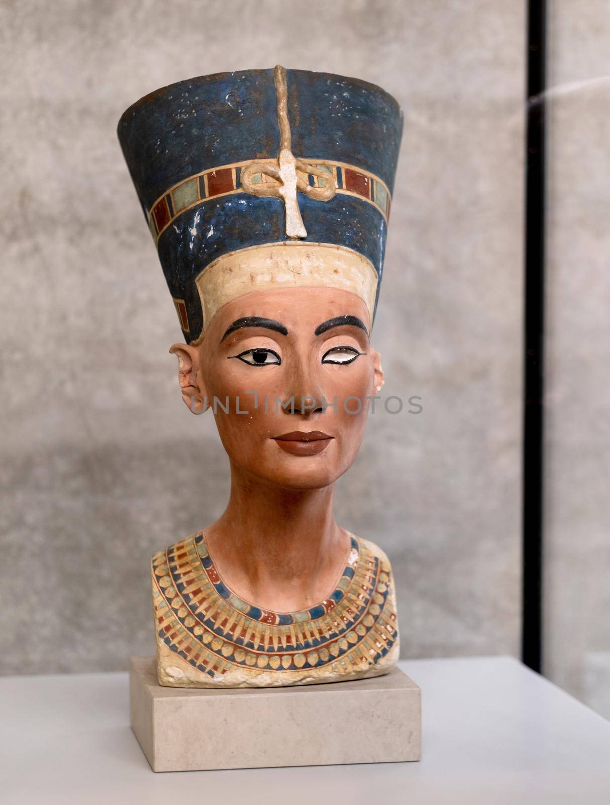Ancient statue of Nefertiti in Neues Museum in Berlin, Germany. Egyptian princess pharaon bust in European art collection. Antique sculpture