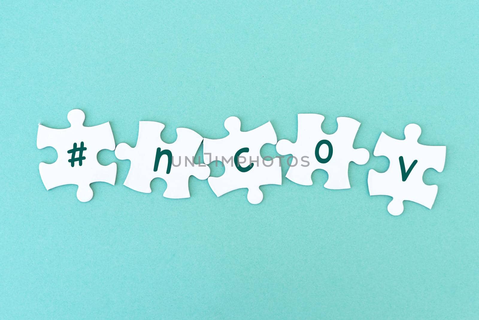 Jigsaw puzzle pieces. Word ncow