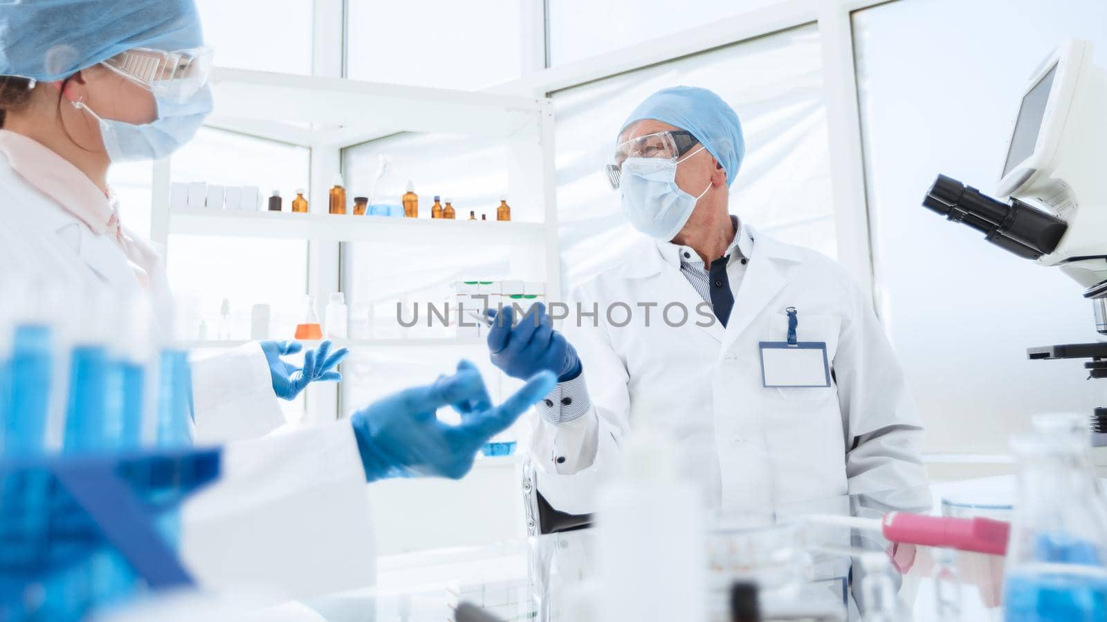 close up. senior scientist arguing about something with his colleague . science and public health.