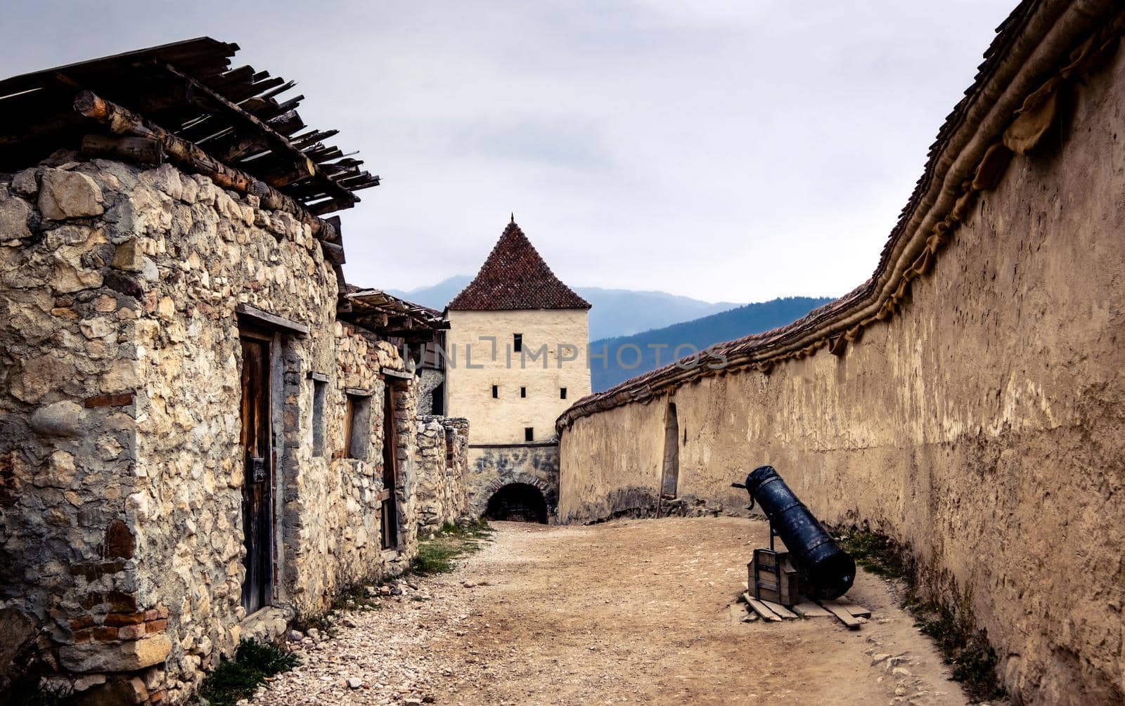 Beautiful Rasnov Citadel courtyard with cannon
