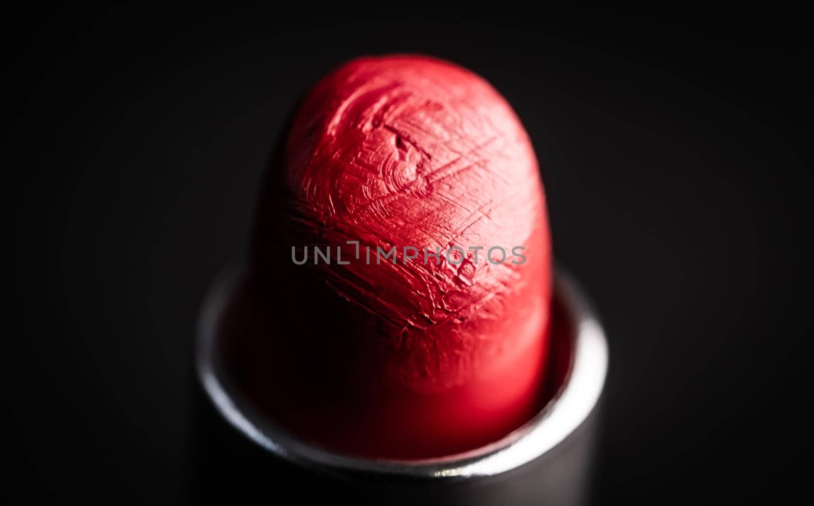 Beautiful red lipstick on black background