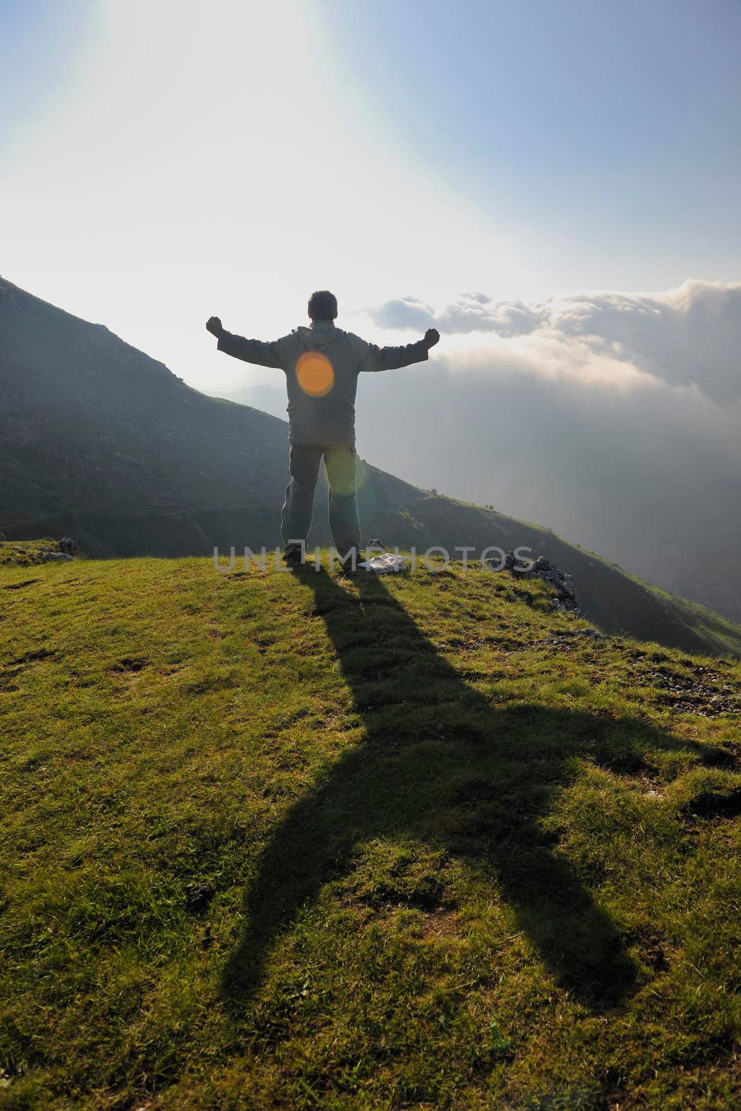 healthy young man practice youga in height mountain at early morning and sunrise