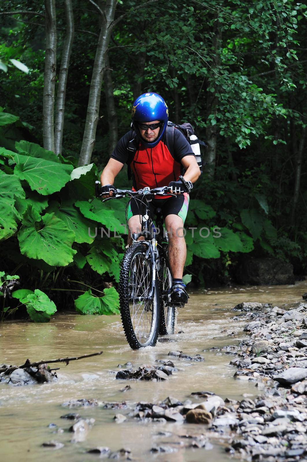 healthy lifestyle and fitness concept with mount bike man outdoor