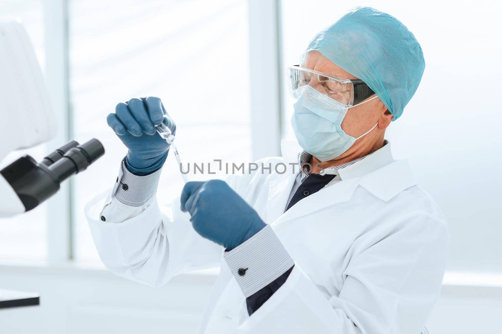 close up. scientist pharmacist works in a laboratory . photo with a copy-space.