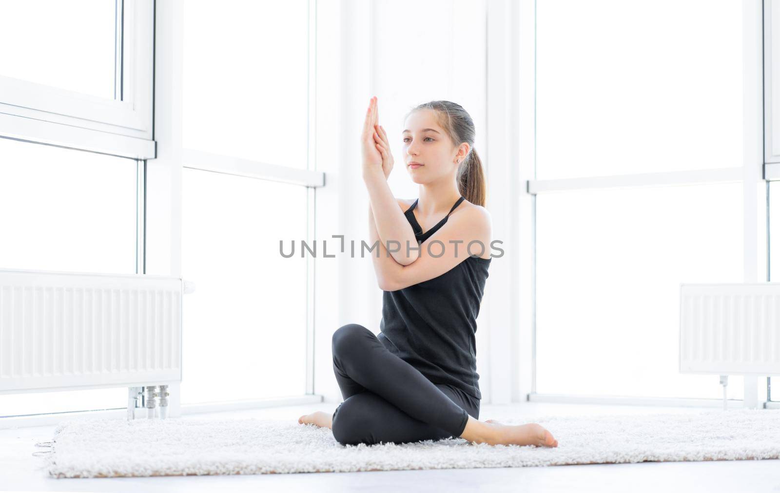 Beautiful girl doing yoga asana by GekaSkr