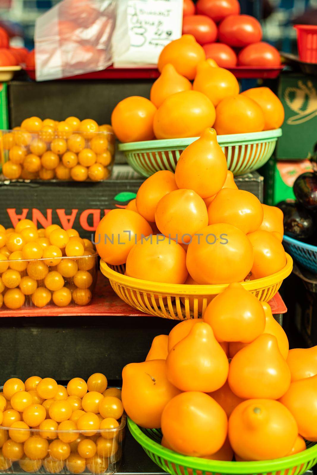 Beautiful picture of red and white tomatoes sold on the market