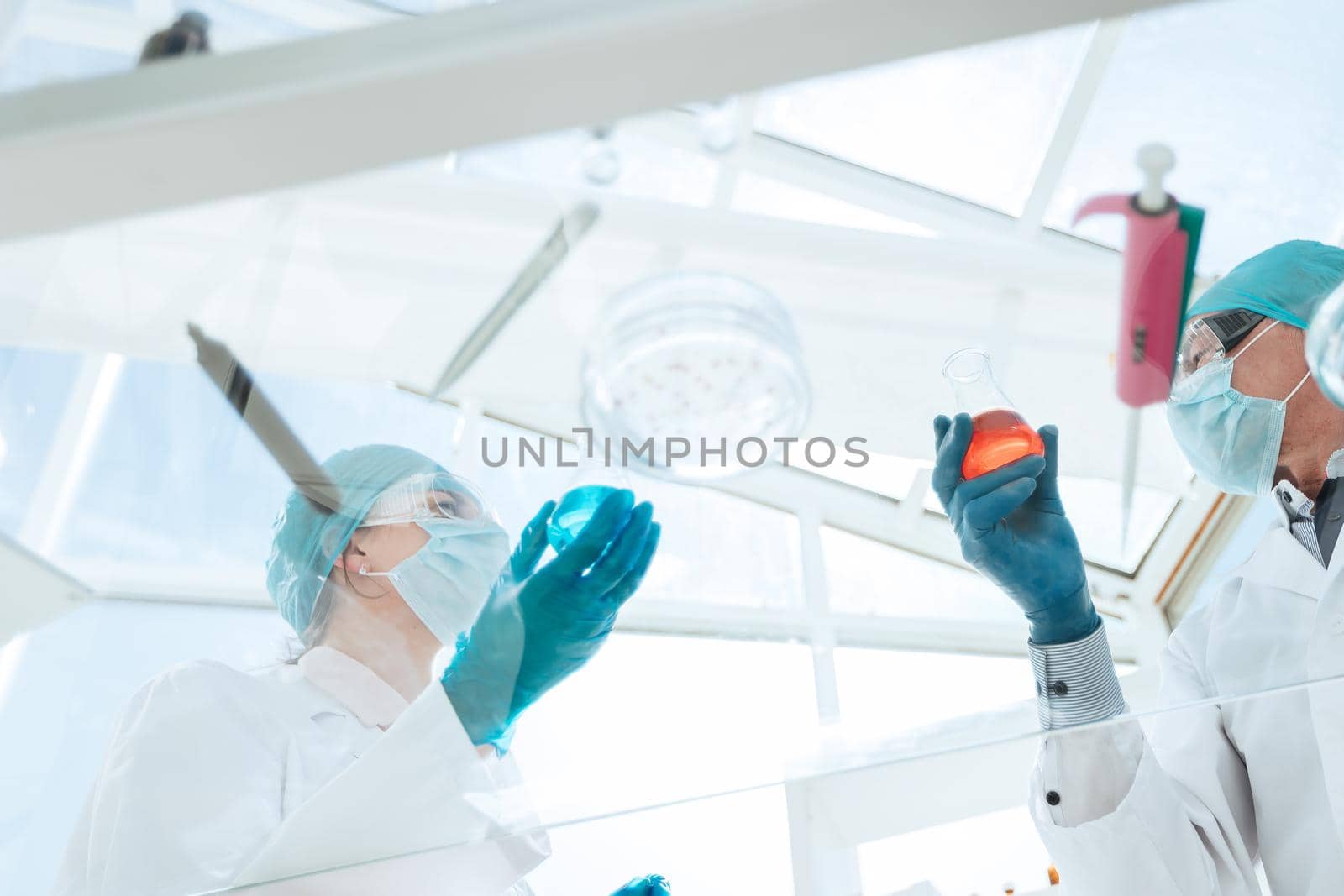 modern scientists and doctors work in a medical laboratory. photo with a copy-space.