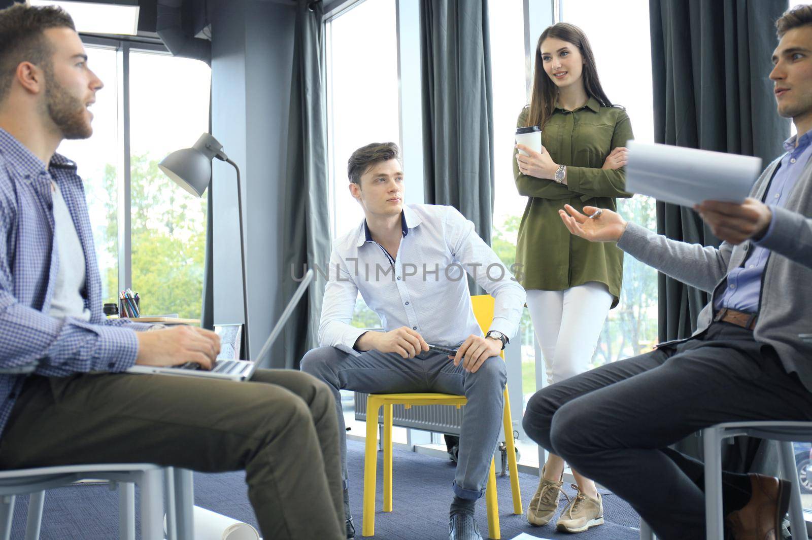 Group of young business people. They working on new project. Startup concept.