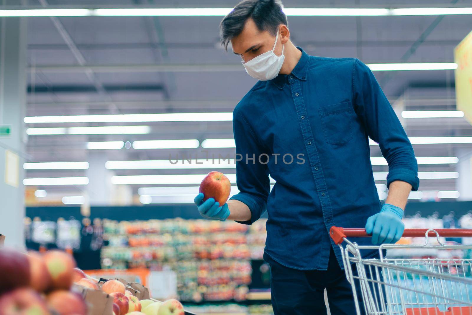 casual man buying fruit in the quarantine period. security concept