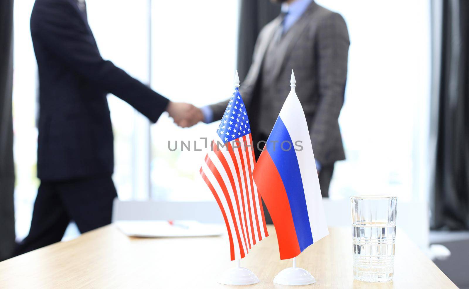 European Union and American leaders shaking hands on a deal agreement by tsyhun