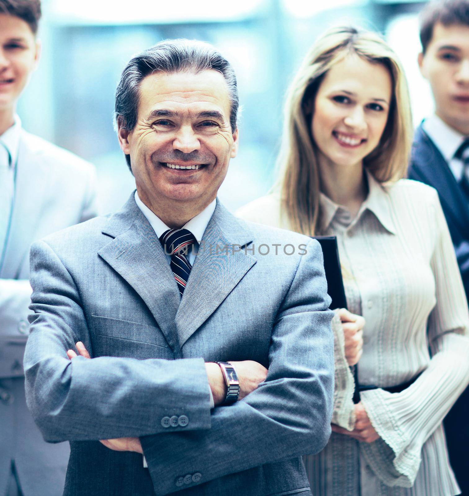 Group portrait of a professional business team looking confidently at camera