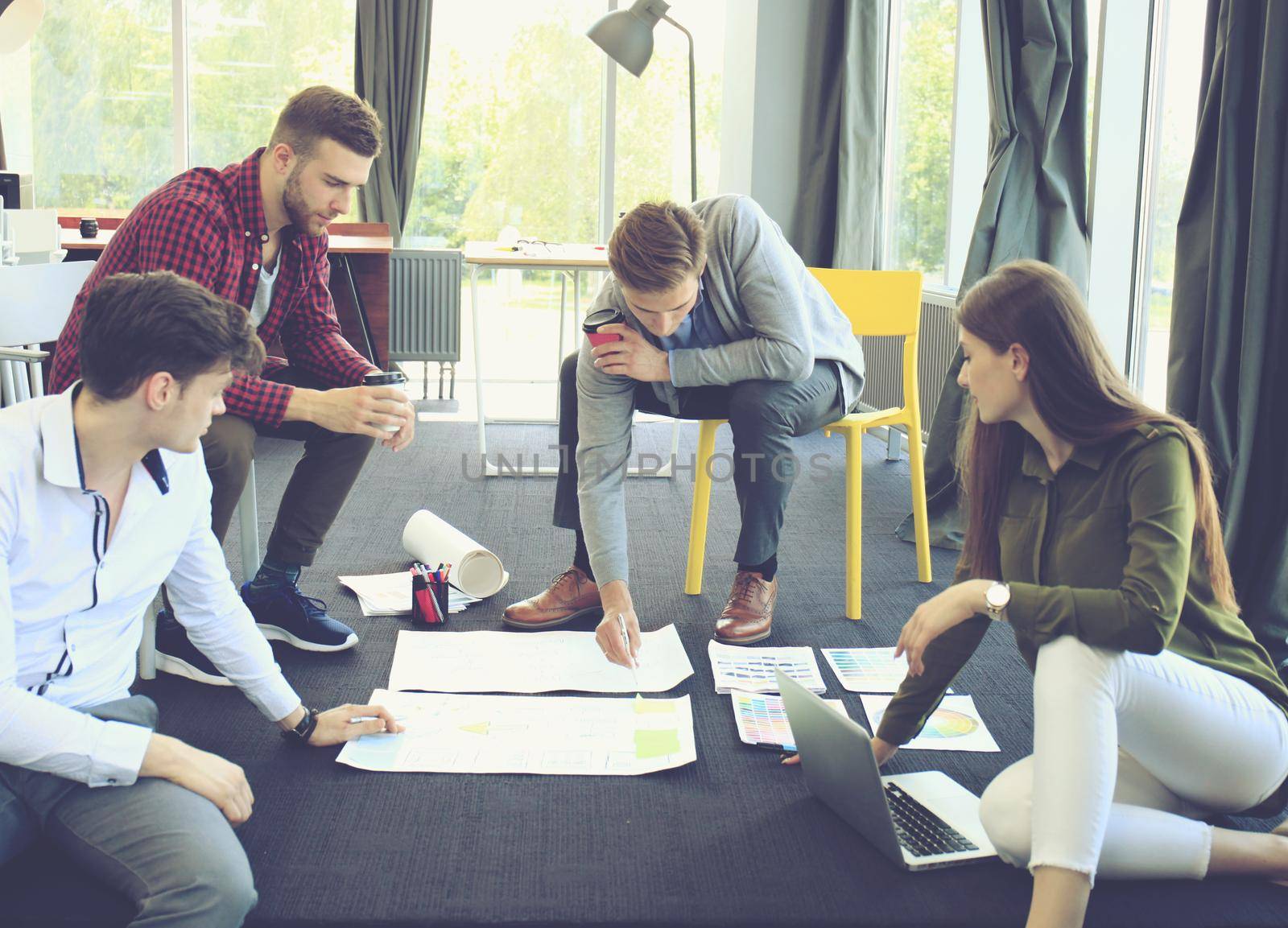 Group of young business people. They working on new project. Startup concept.