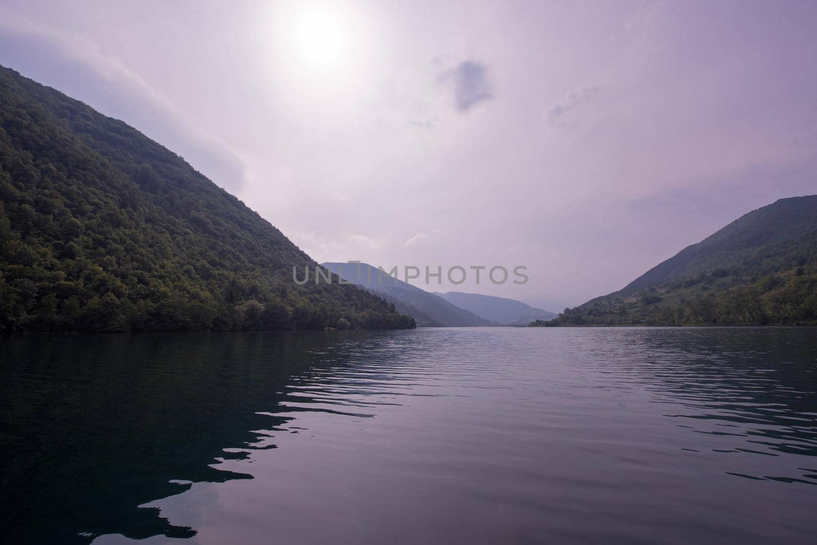 Nature conceptual image. Evening on the lake at beautiful summer nature