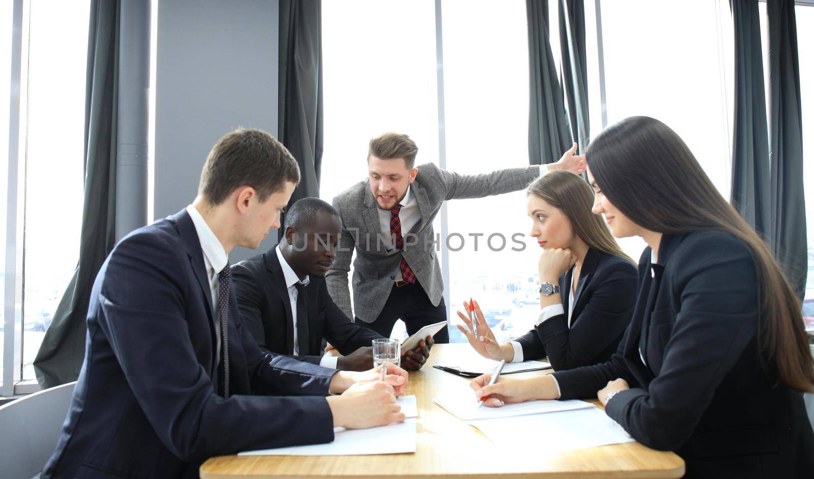 Manager yelling at his employees at the meeting. Company is in recession.