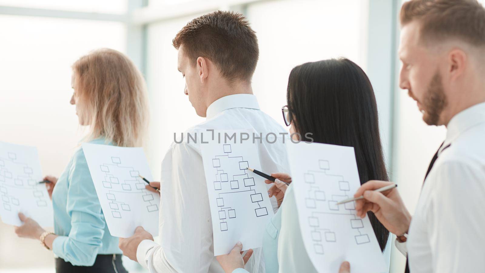 close up. managers with marketing offers stand in line. business concept
