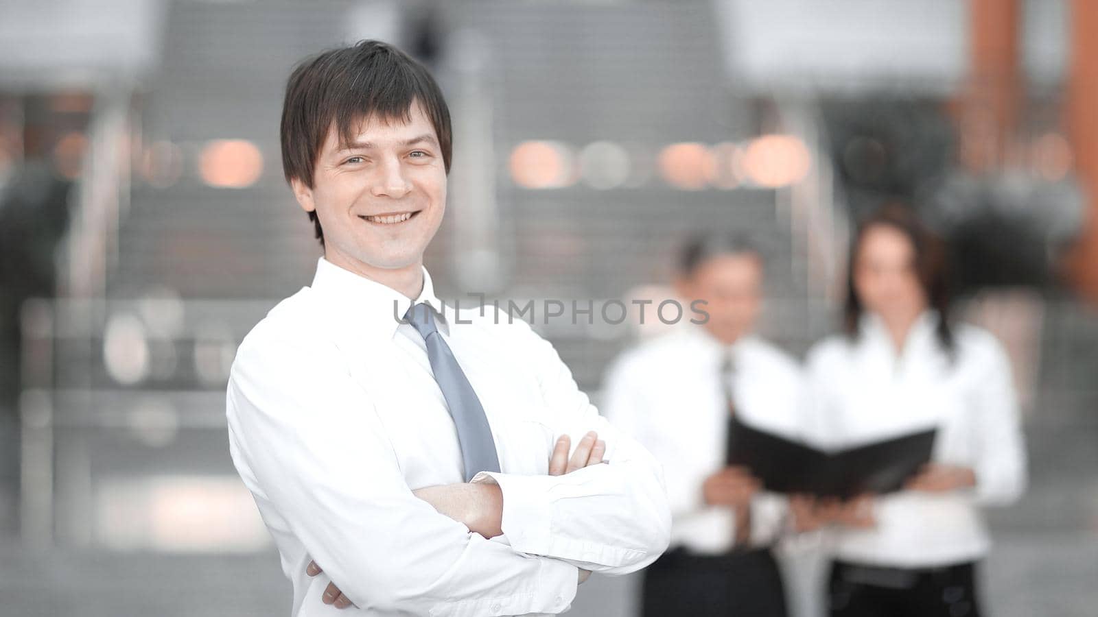 successful employee in the background of the office. business concept