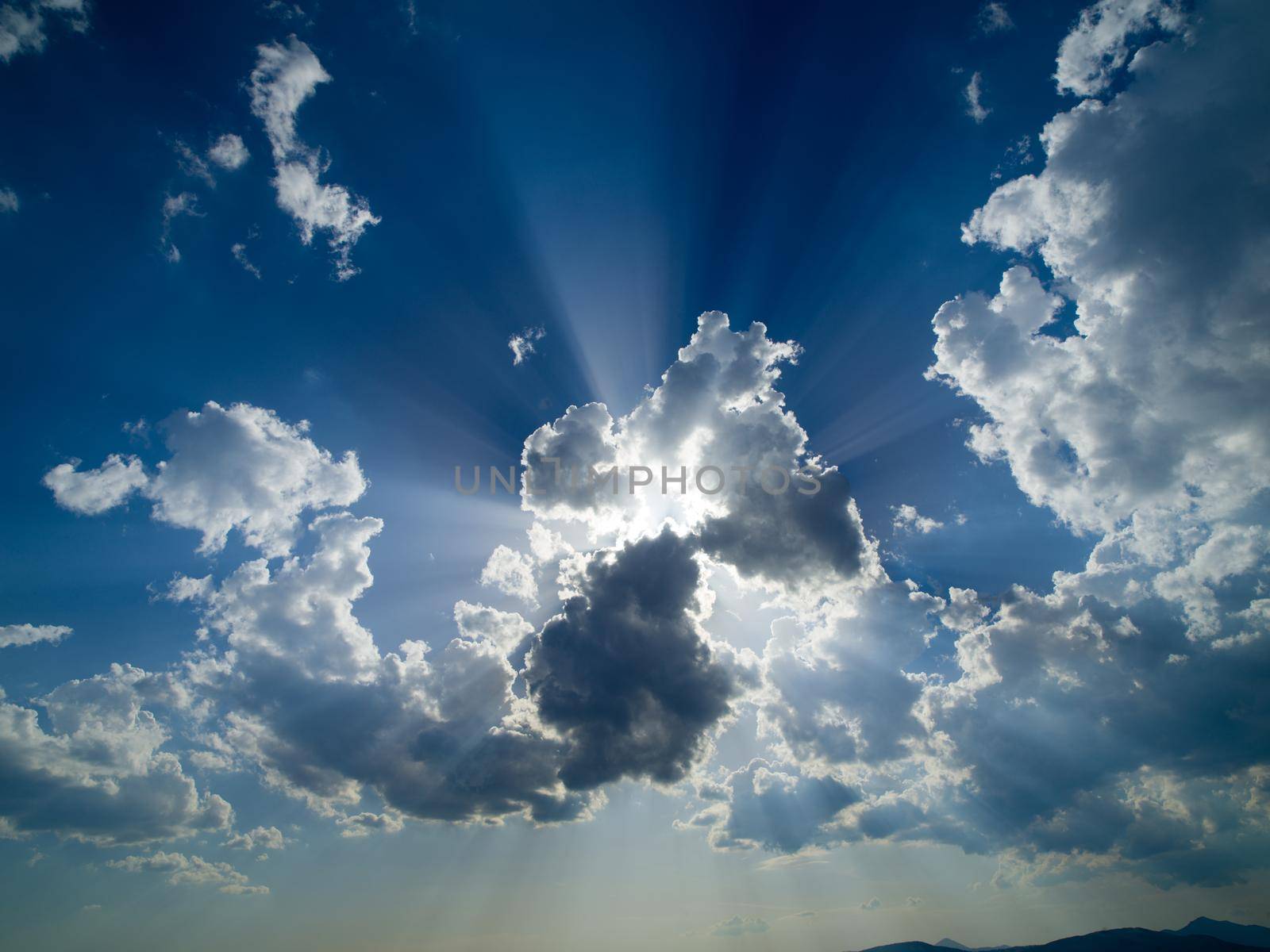 summer evening  blue sky with beautiful clouds and sunshine