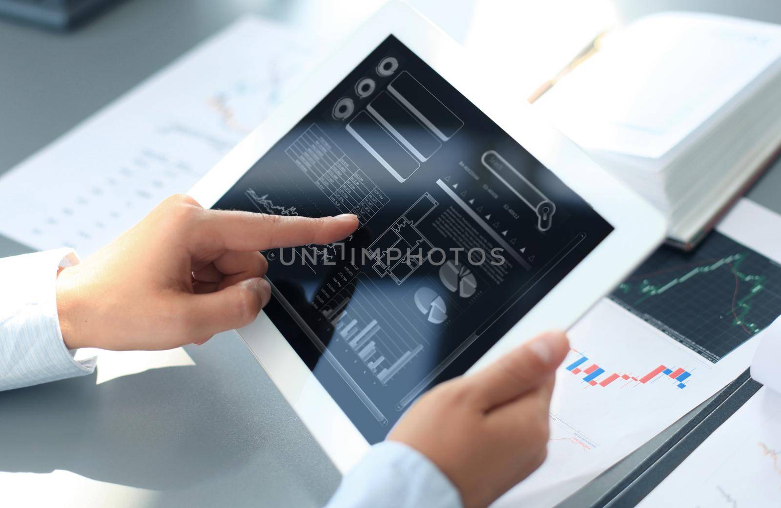 businessman working with digital tablet computer on wooden desk as concept