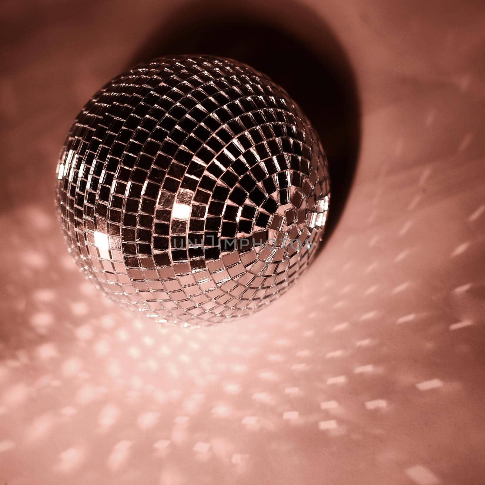 beautiful disco ball on yellow background isolated.photo with copy space