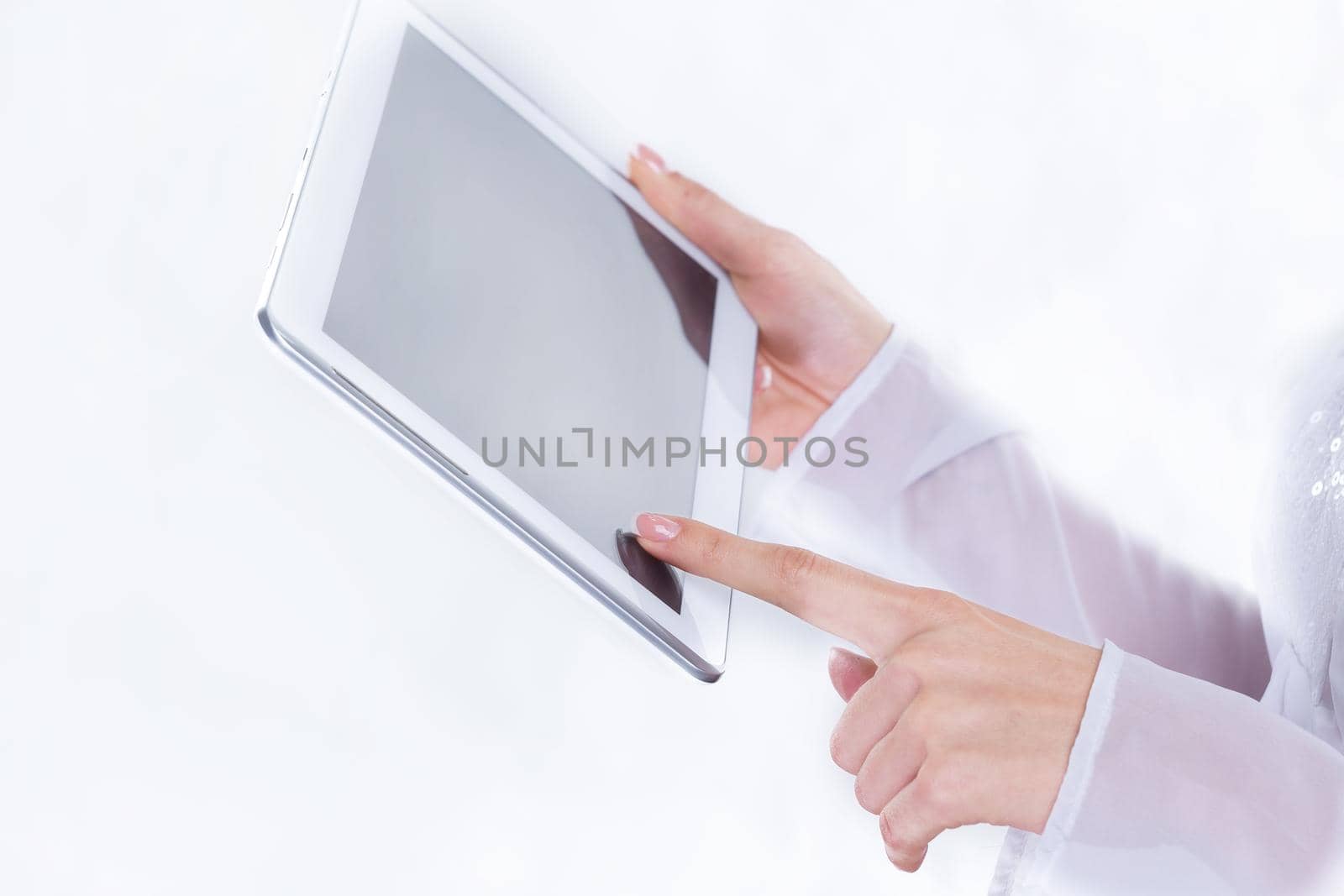 close up. business woman uses digital tablet . photo with copy space